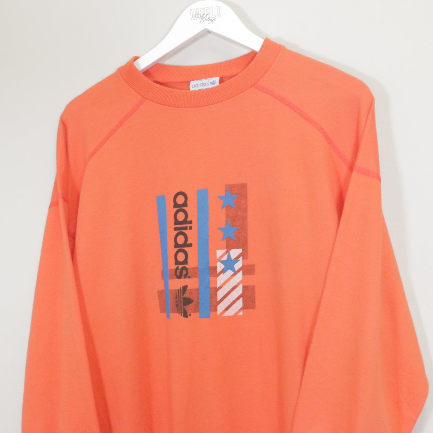 Vintage Adidas sweatshirt in orange. Best fits M