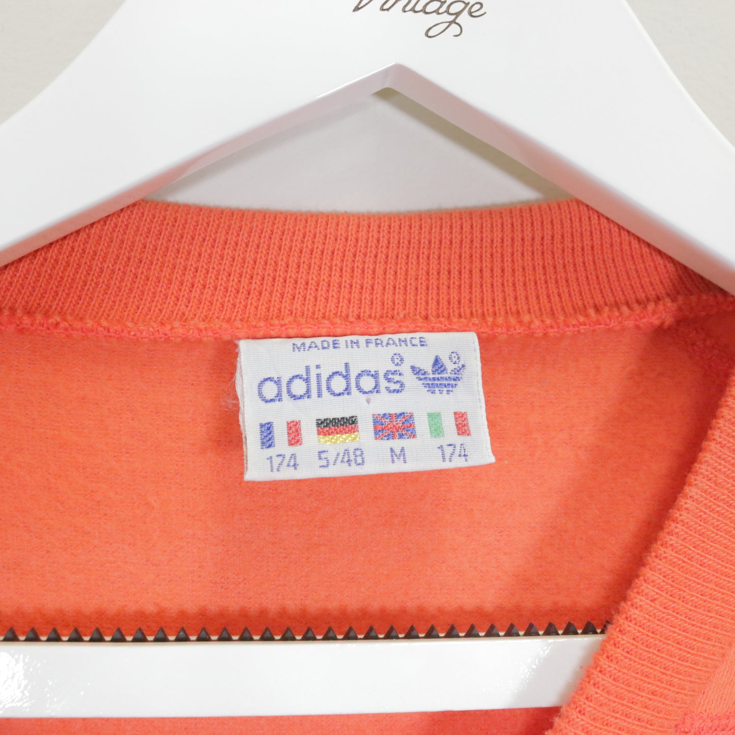 Vintage Adidas sweatshirt in orange. Best fits M