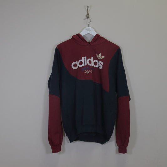 Vintage adidas hoodie in red and black. Best fits L