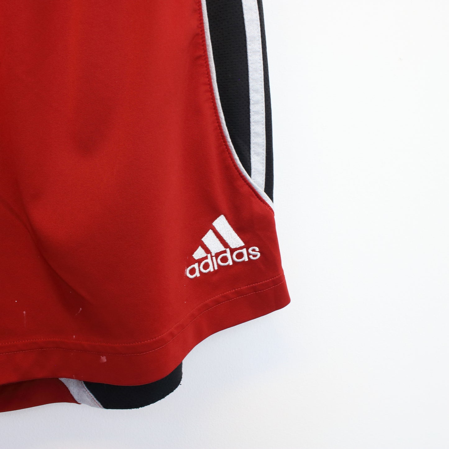 Vintage Adidas shorts in red and black. Best fits L