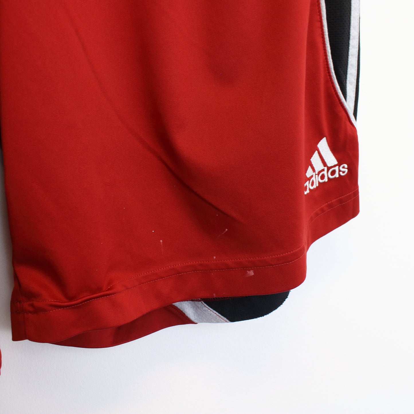 Vintage Adidas shorts in red and black. Best fits L