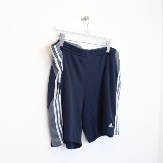 Vintage Adidas two tone shorts in navy and grey. Best fits XL