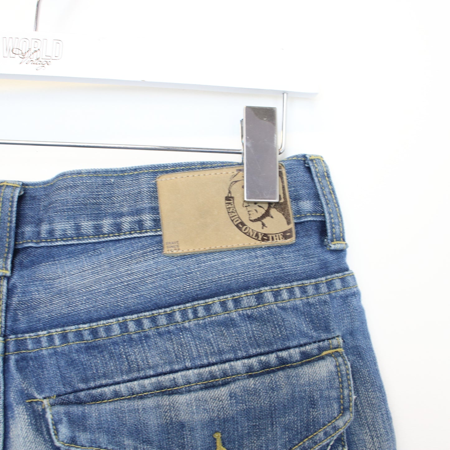 Vintage Diesel denim shorts in blue. Best fits W32