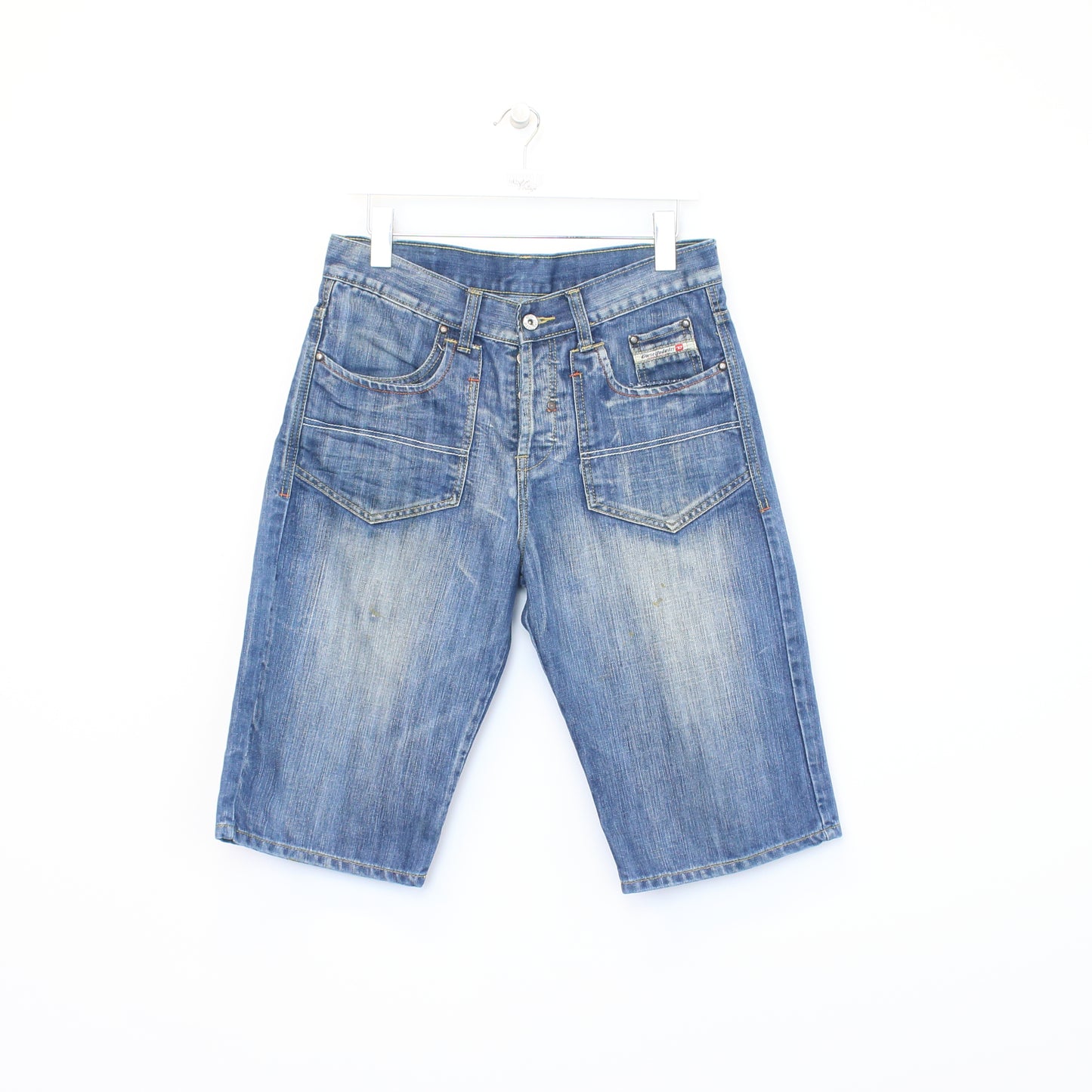 Vintage Diesel denim shorts in blue. Best fits W32