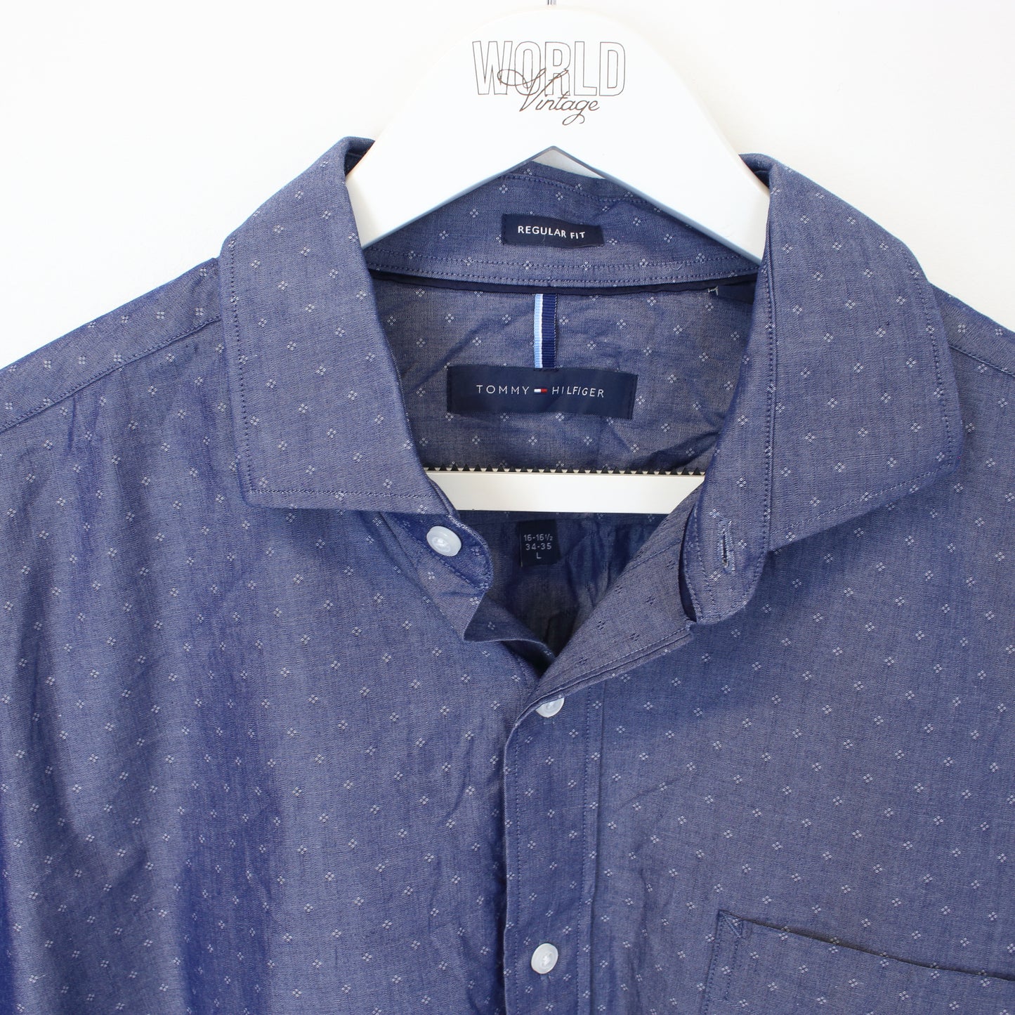 Vintage Tommy Hilfiger patterned shirt in blue. Best fits L