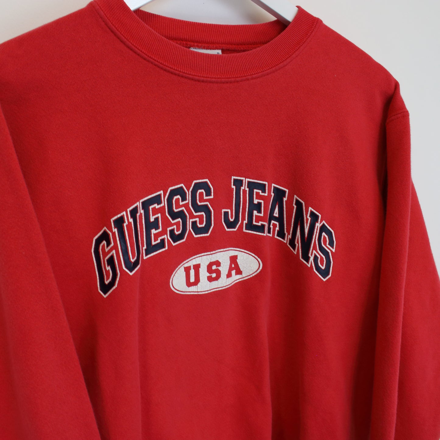 Vintage Guess Jeans sweatshirt in red. Best fits size M