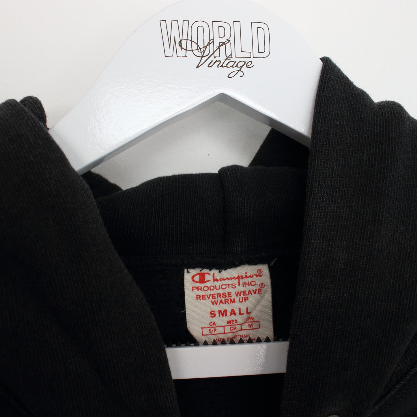 Vintage Champion hoodie in black. Best fits S
