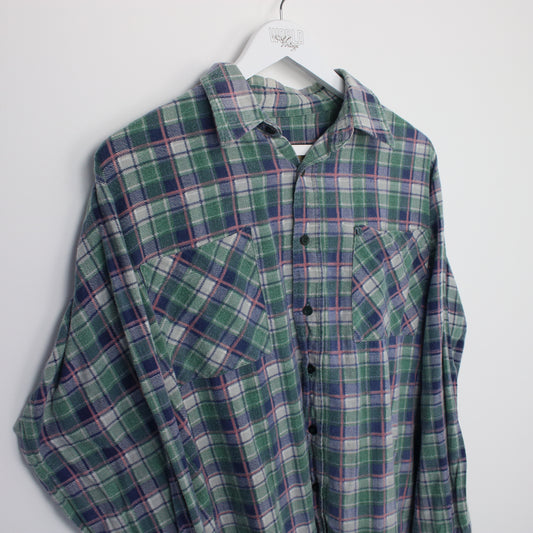 Vintage unbranded flannel shirt in blue, green and pink. Best fits L