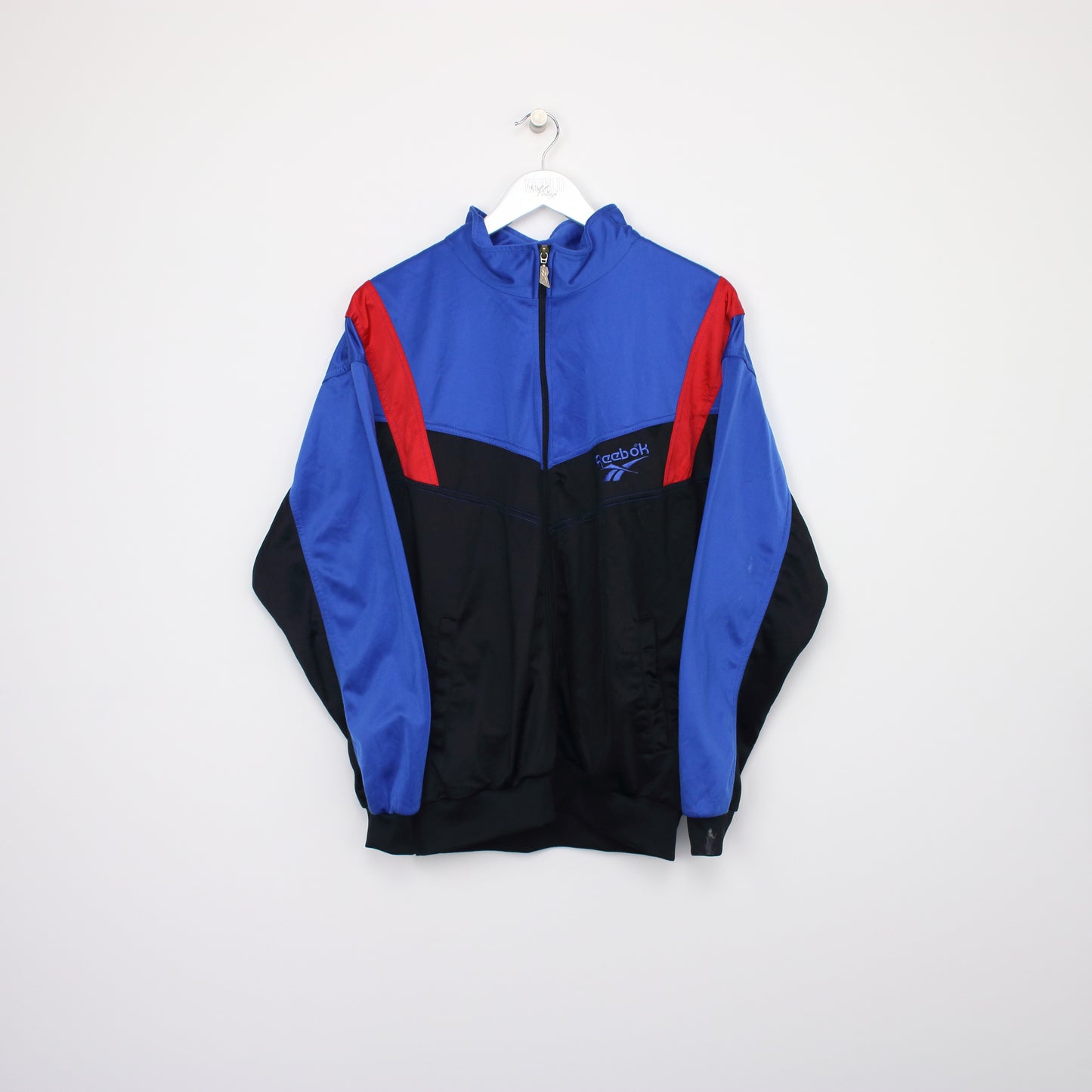 Vintage Reebok track jacket in blue, black and red. Best fits S