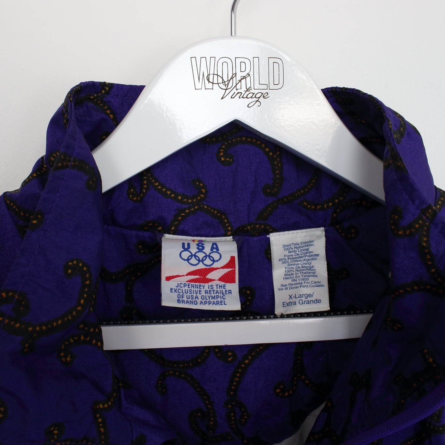 Vintage USA Olympic track jacket in purple and yellow pattern. Best fits XL