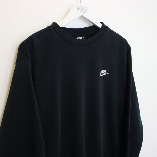 Vintage Nike reworked sweatshirt in black. Best fits M