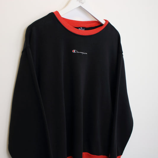 Vintage Champion reworked sweatshirt in black. Best fits S
