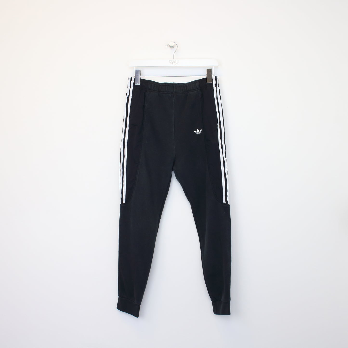 Vintage Adidas joggers in black. Best fits S