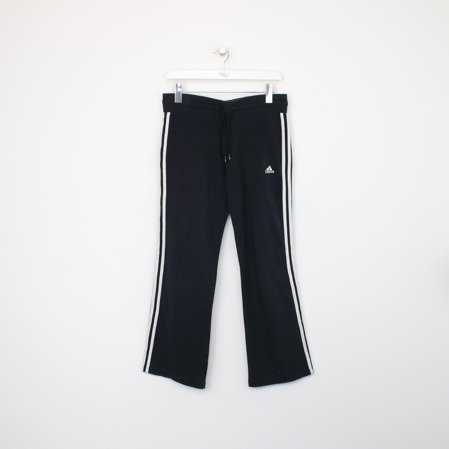 Vintage Adidas joggers in black. Best fits S