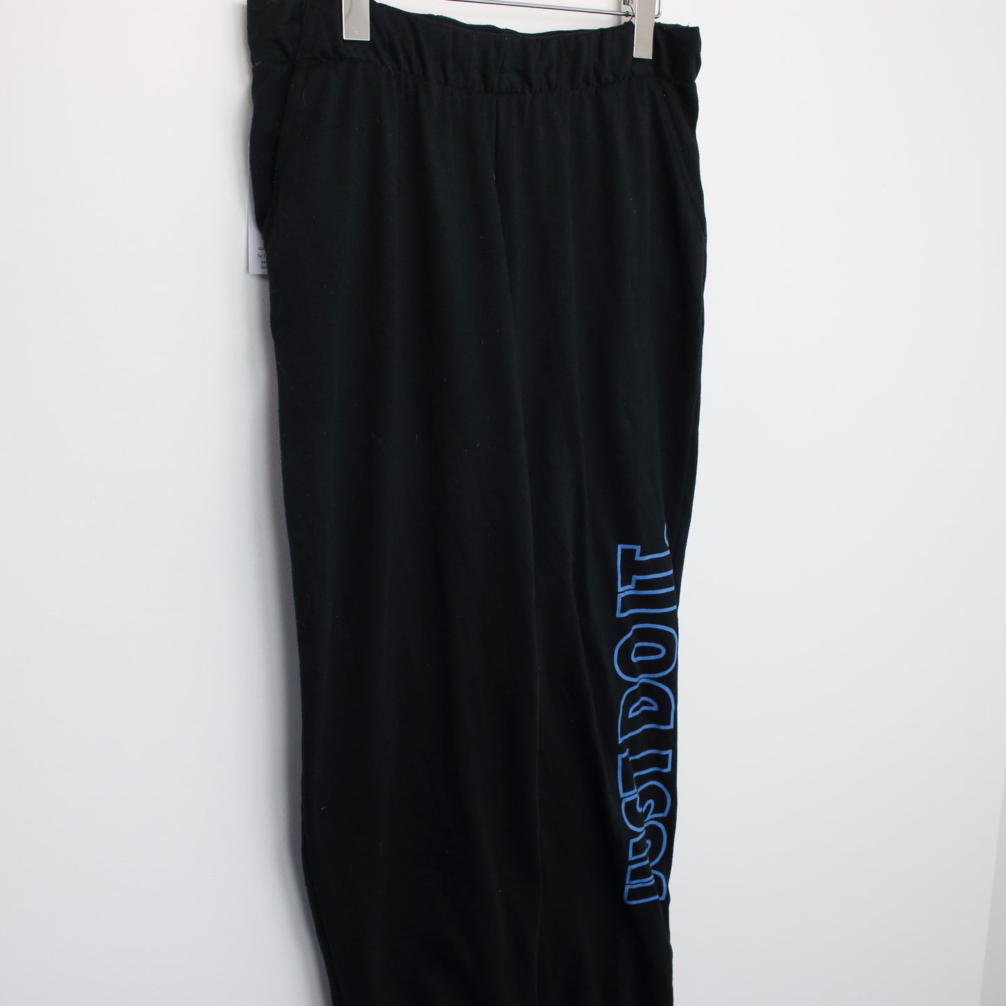 Vintage Nike joggers in black. Best fits L