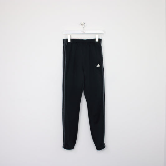 Vintage Adidas joggers in black. Best fits S