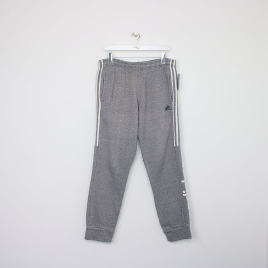 Vintage Adidas joggers in grey. Best fits M