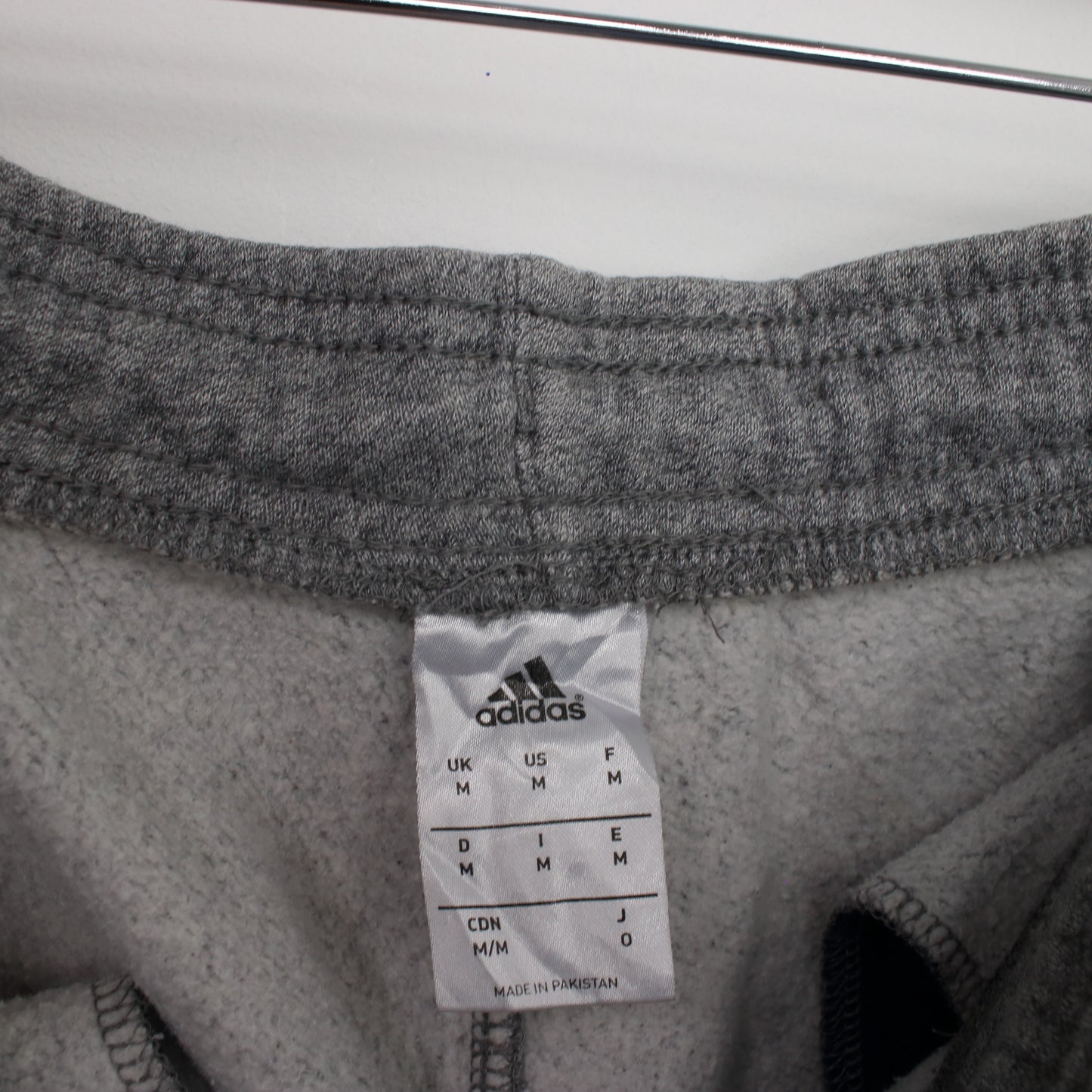 Vintage Adidas joggers in grey. Best fits M