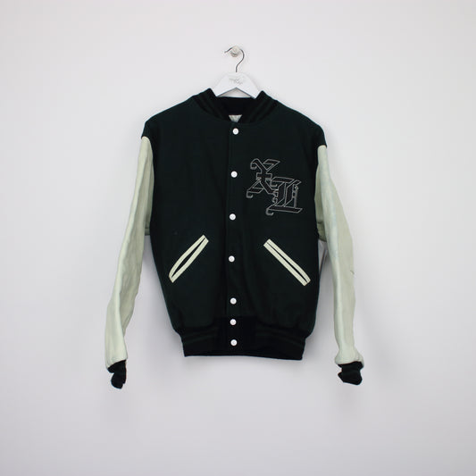 Vintage varsity jacket in green and white. Best fits M