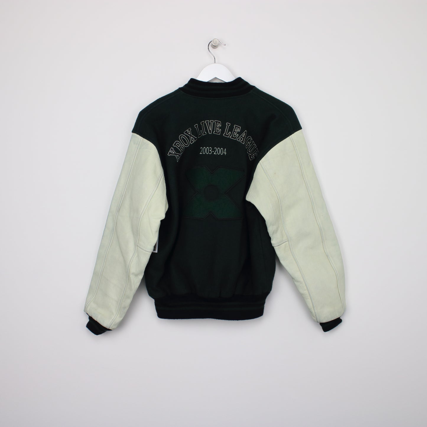 Vintage varsity jacket in green and white. Best fits M