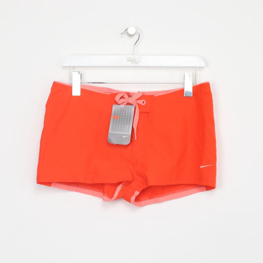 Vintage DEADSTOCK BNWT Y2K Womens Nike swim shorts in orange